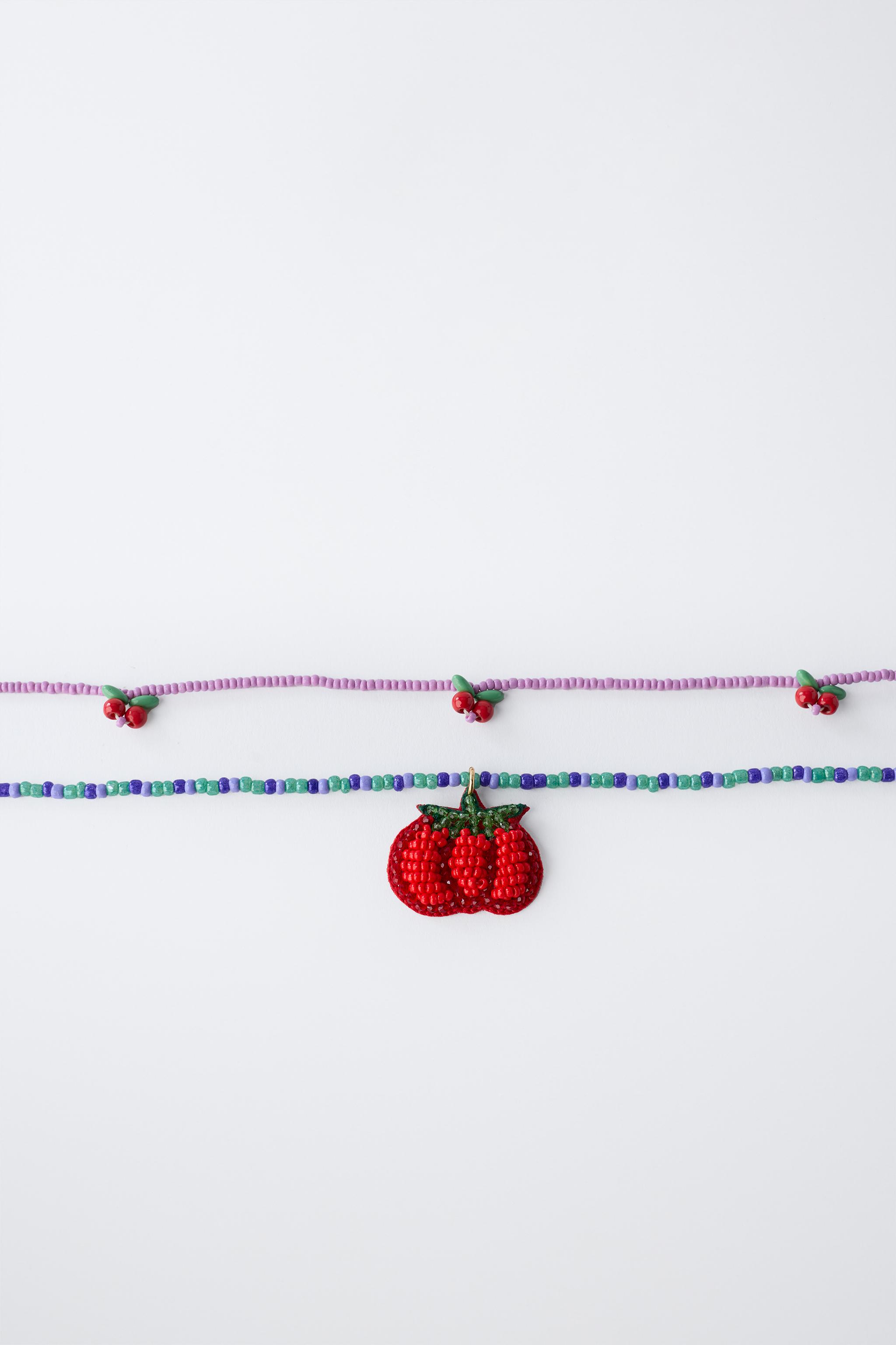 LOT DE DEUX COLLIERS FANTAISIE TOMATE